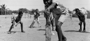 Young boys in the Caribbean playing cricket